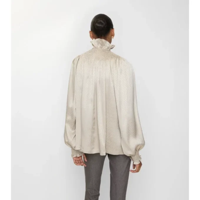 Blusa de seda geométrica