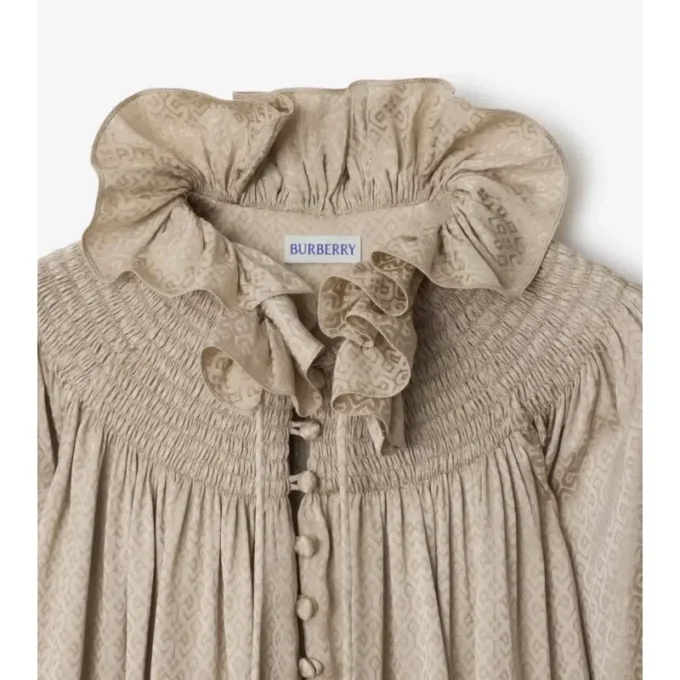 Blusa de seda geométrica