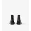 Botas Chelsea de piel con paneles de cuadros