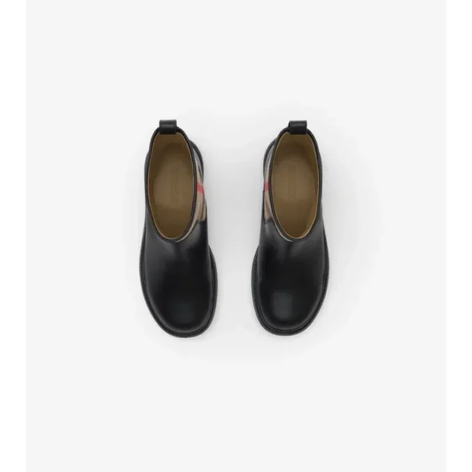 Botas de piel con paneles de cuadros