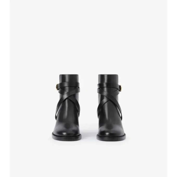 Botas de tacón con estampado de cuadros y piel