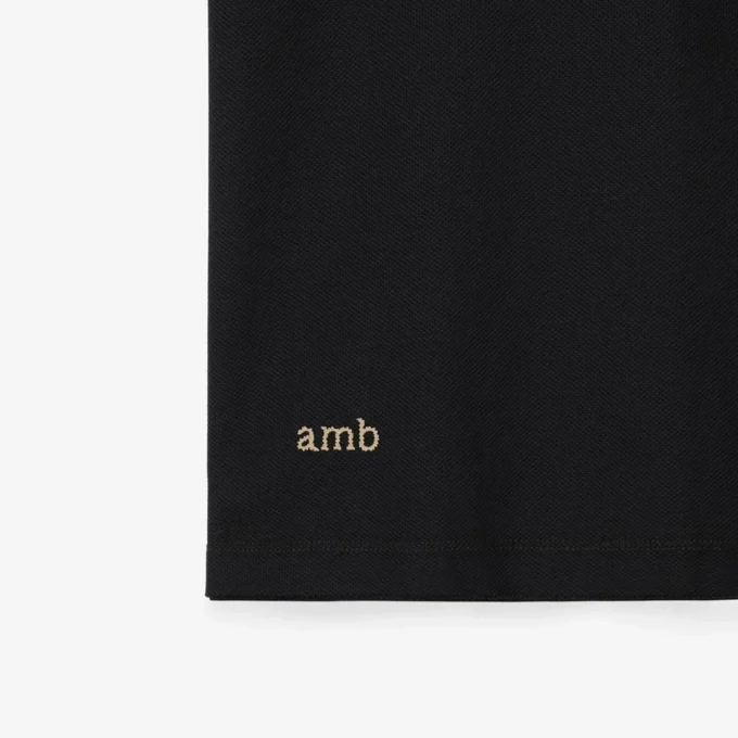 Camisas de algodón con logotipo en el cuello