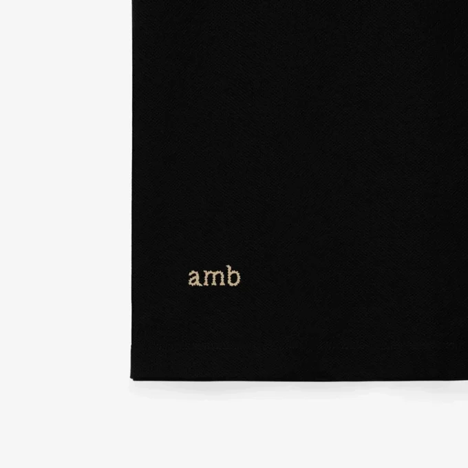Camisas de algodón con logotipo en el cuello