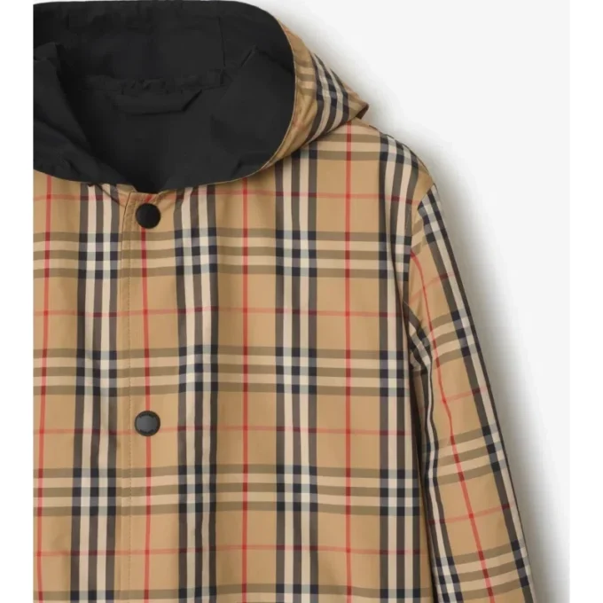 Chaqueta con capucha reversible de nailon con estampado de cuadros