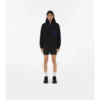 Chaqueta corta con capucha de nailon
