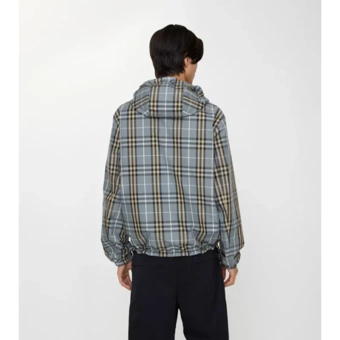 Chaqueta reversible con capucha y estampado de cuadros