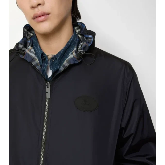 Chaqueta reversible con capucha y estampado de cuadros