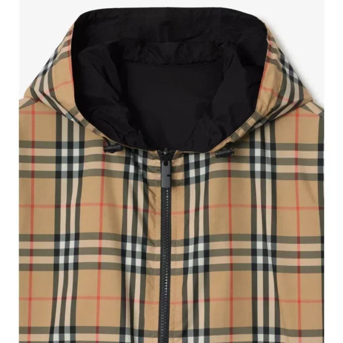 Chaqueta reversible con capucha y estampado de cuadros