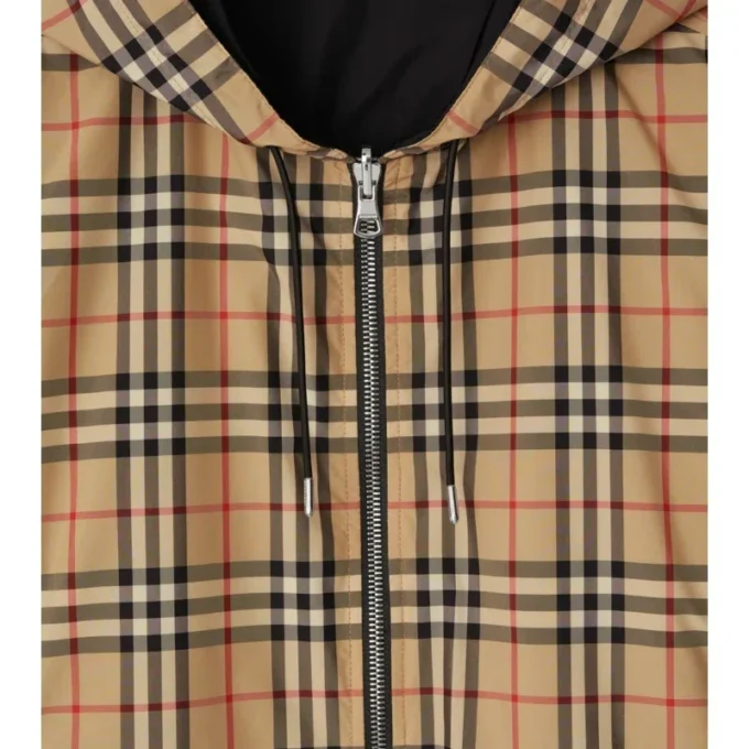 Chaqueta reversible con capucha y estampado de cuadros