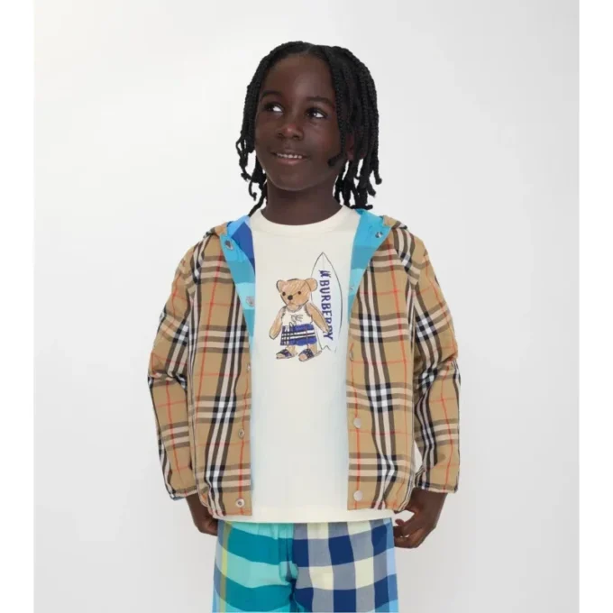 Chaqueta reversible de nylon con capucha y estampado de cuadros