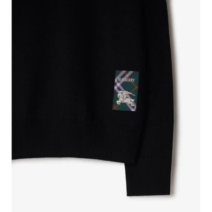 Jersey de lana con etiqueta de cuadros