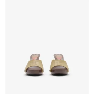 Mules Potter de piel con estampado de cuadros 