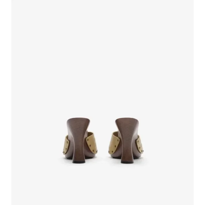 Mules Potter de piel con estampado de cuadros 