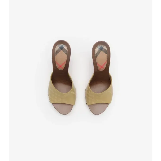 Mules Potter de piel con estampado de cuadros 