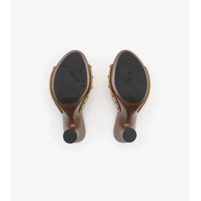 Mules Potter de piel con estampado de cuadros 