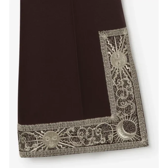 Pantalones acampanados cortos de lana y seda bordados