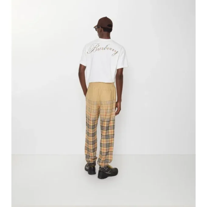 Pantalones de chándal de algodón con estampado de cuadros degradado