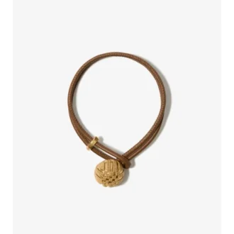 Pulsera de piel con granulado en forma de cuadros 