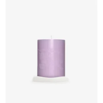 Vela de rosa y flor de violeta