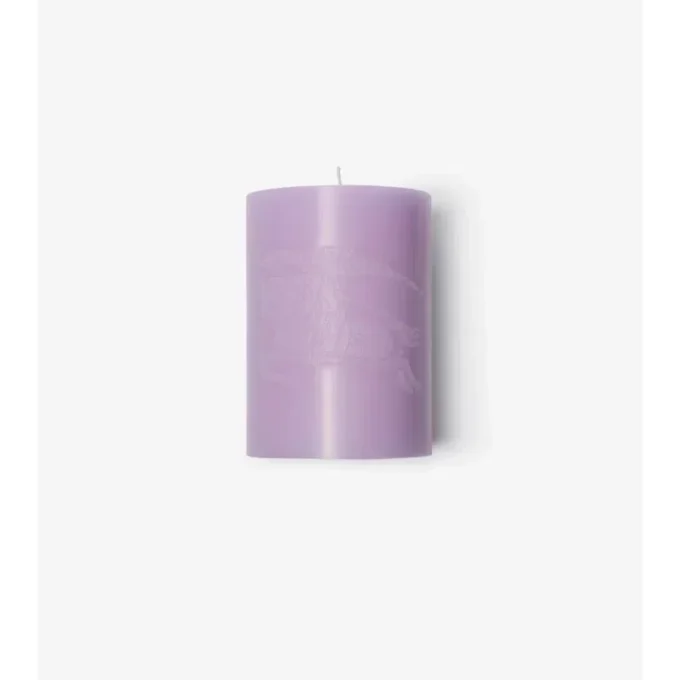 Vela de rosa y flor de violeta