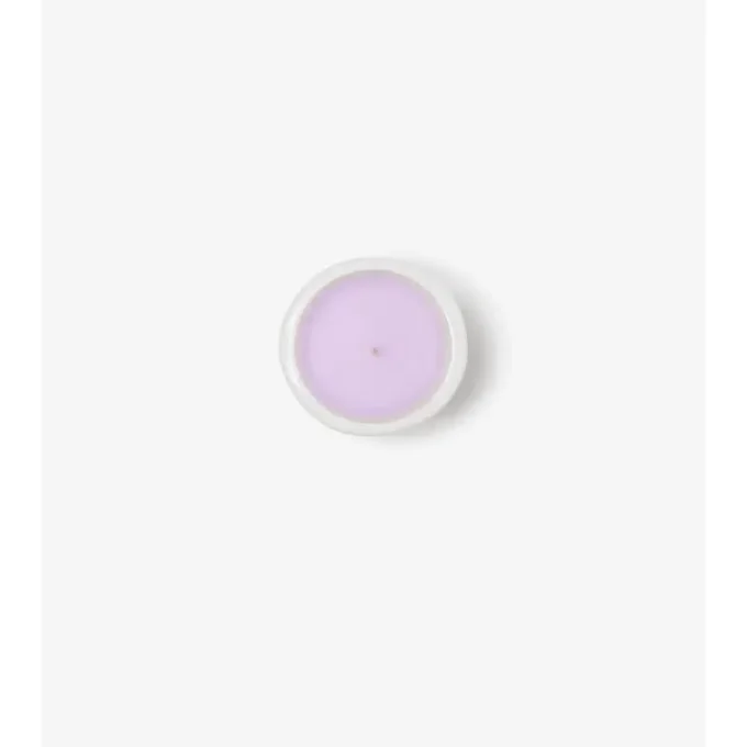 Vela pequeña con aroma a rosa y violeta