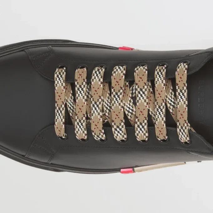 Zapatillas de cuero con detalle de rayas
